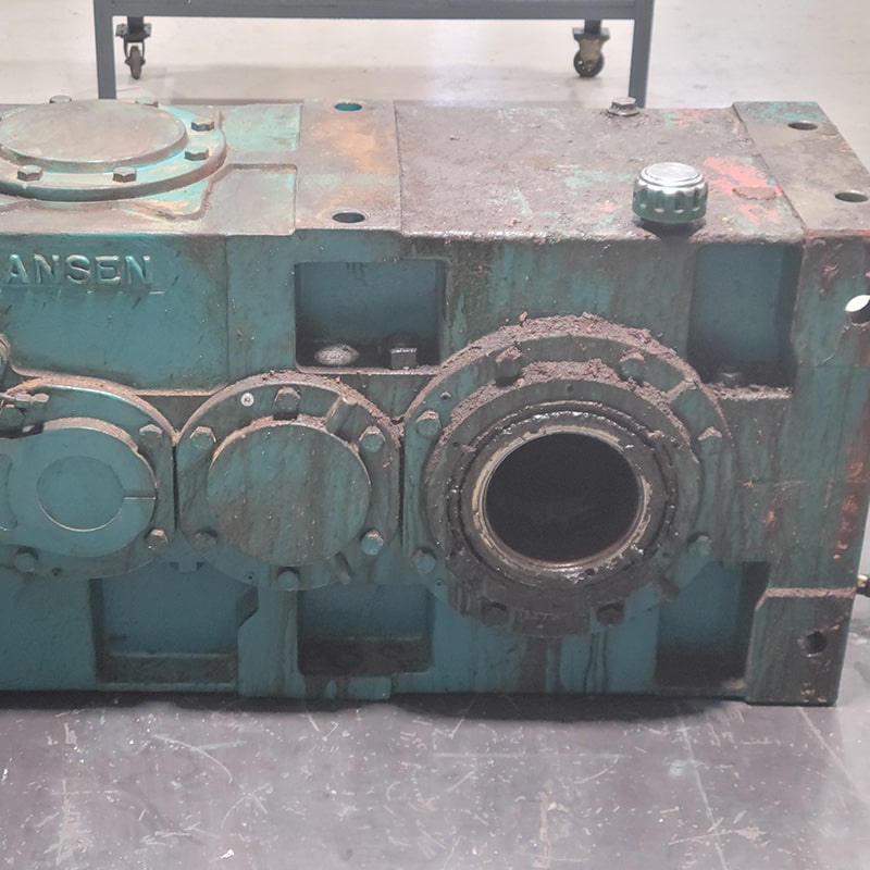 Hansen industrial gearbox — worn, contaminated, before rebuild